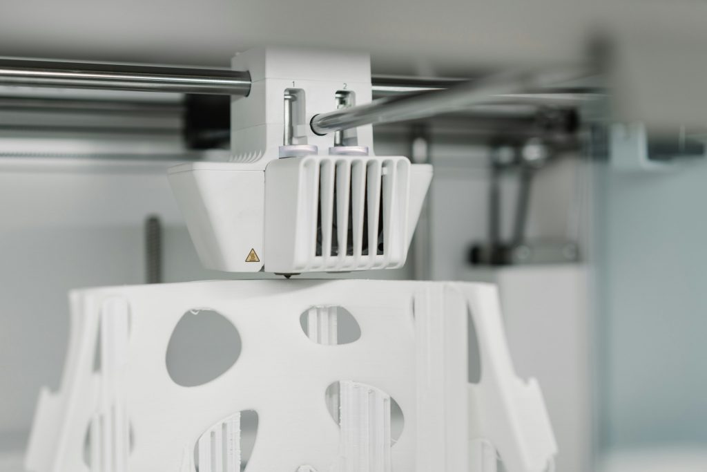 Hintergrund Bild eines 3D-Druckers, Zeigt FDM.werk und FDM 3D-Druck